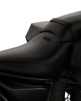 We see the divided seat with pillion passenger seat.