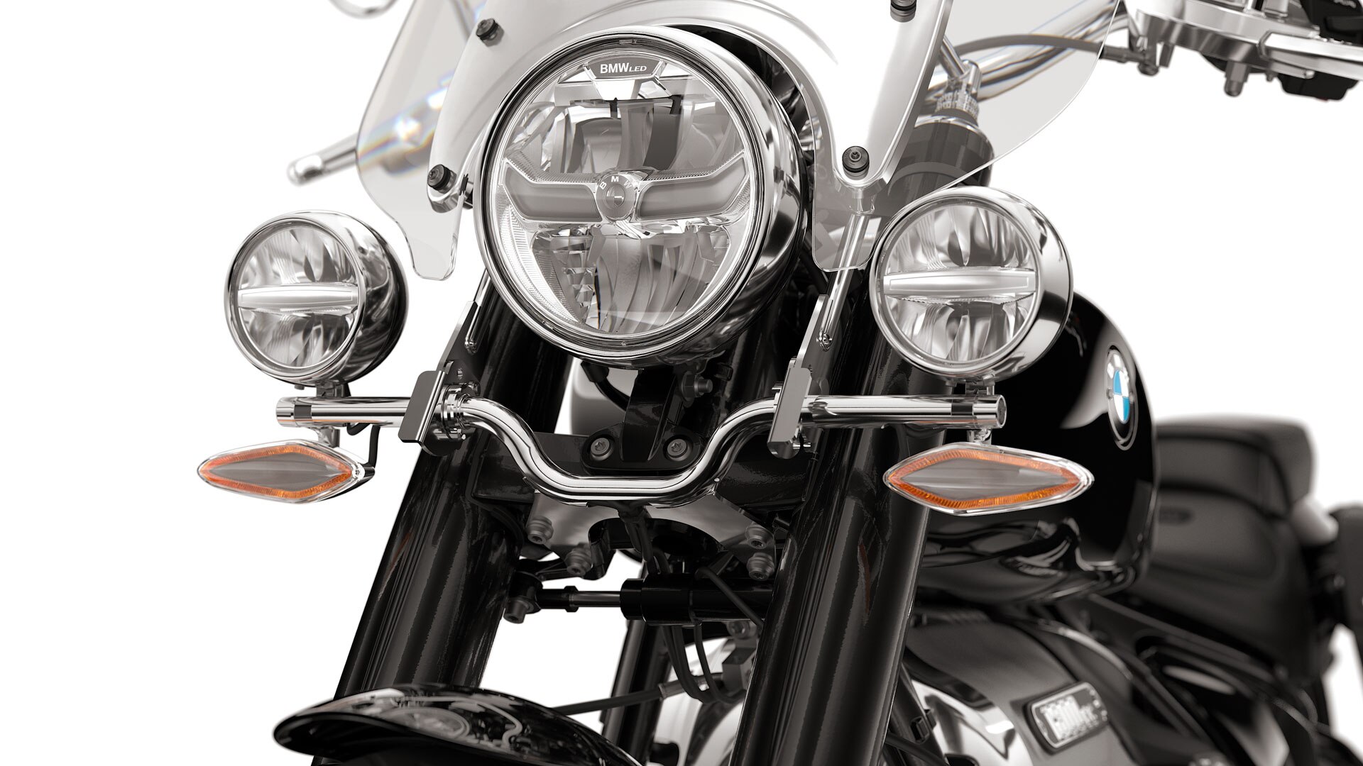 We see both of the smaller auxiliary headlights to the left and right of the main headlights.