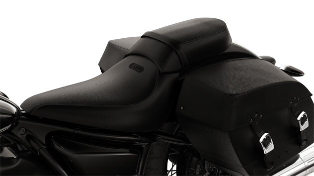 We see the divided seat with pillion passenger seat.