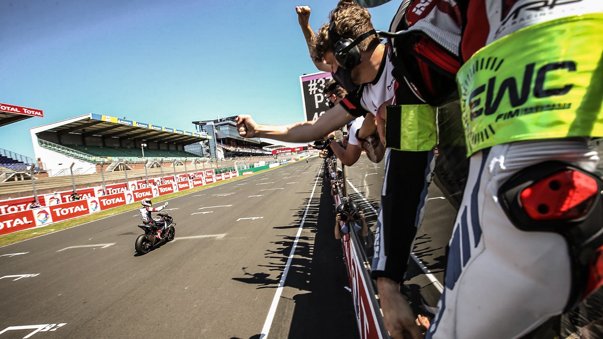 Several racing bikes on the race track