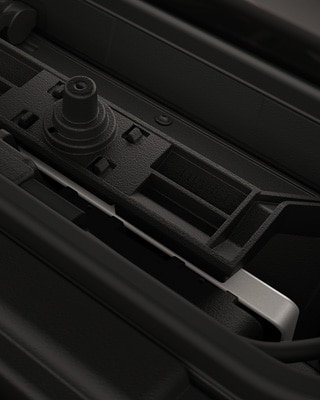 Integrated storage compartment with mobile phone.