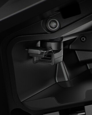 We see the USB charging socket in the storage compartment of the C 400 X.