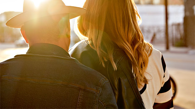The focus of the image is the rear view of the RoadCrafted men's denim jacket.