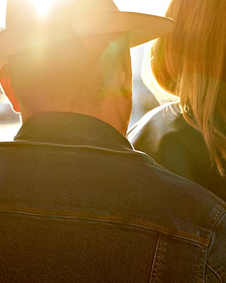 The focus of the image is the rear view of the RoadCrafted men's denim jacket.